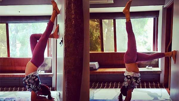 மேலாடை நழுவுவது கூட தெரியாமல் தலைகீழாக யோகா செய்த பிரபல நடிகை! வைரலாகும் போட்டோ!