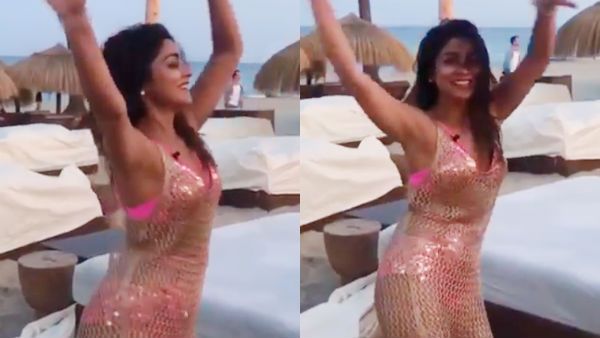 பிங்க் பிகினி ஃபிஷ்நெட் உடை.... ஸ்ரேயா பெல்லி டான்ஸ் - ஐஸ்லாந்து பீச்சே சூடாயிருச்சிப்பா