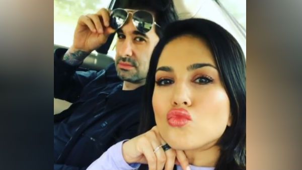 கடவுளின் தேசத்தில் சன்னி லியோன்.. கணவருடன் காரில் உம்மா.. உம்மா.. வைரலாகும் வீடியோ!