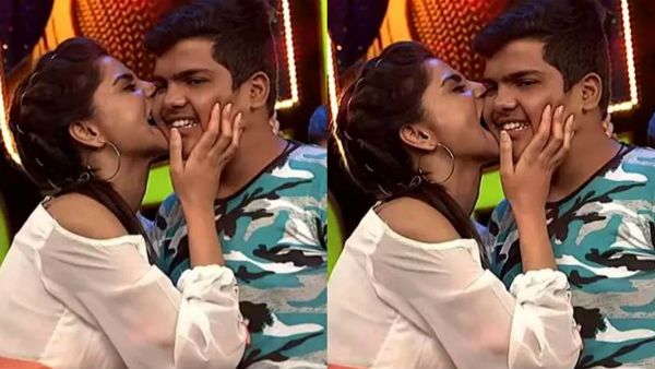 படாரென கூட்டத்தில் பாய்ந்து திடீரென பார்வையாளரின் கன்னத்தை கடித்த பிரபல தொகுப்பாளினி.. வைரல் வீடியோ