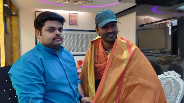 தலையில் தொப்பி..சால்வை அணிந்து..தர்பாரை ரசித்த தனுஷ்