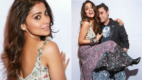 காலைத் தூக்கி எங்கு வைத்திருக்கிறார் பாருங்க... ஸ்ரேயா.. இது தேவையா!