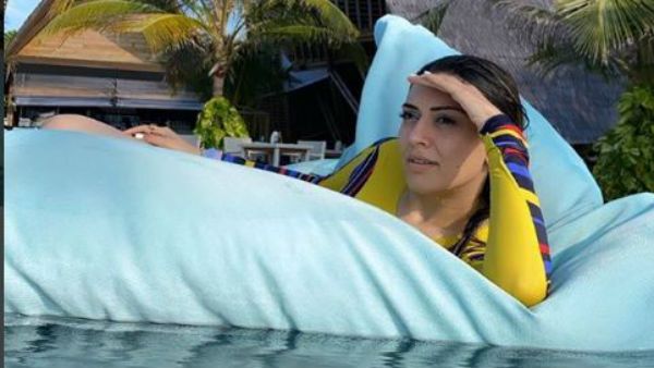 இது என்ன குறலி வித்தை? மாலத்தீவு கடற்கரையில் வில்லாக வளைந்த ஹன்சிகா... தில்லாக கலாய்க்கும் ஃபேன்ஸ்!