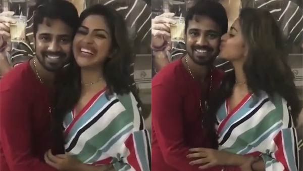 ரசிகரை கட்டியணைத்து முத்தம் கொடுத்த ஆடைப் பட நாயகி.. திடீரென தீயாய் பரவும் வீடியோ!