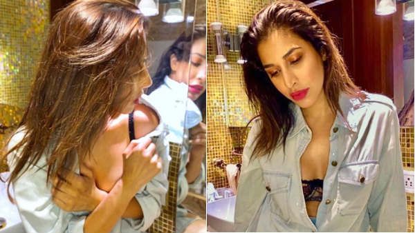 கண்ணாடி முன்னால உட்கார்ந்து, கையை வச்சு மறைச்சபடி.. வைரலாகும் பிரபல நடிகையின் அப்படி இப்படி போஸ்!