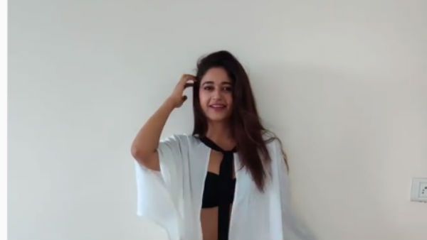 கைய அப்படி வச்சு, காலை இப்படித் திருப்பி.. வைரலாகும் பூனம் பஜ்வாவின் போட்டோஷூட் வீடியோ!