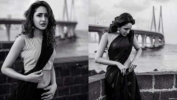 இது அதுக்கும் மேல.. சேலையில் அதிகரிக்கும் அழகு.. கருப்பு வெள்ளையில் பிரபல நடிகையின் க்யூட் லுக்!