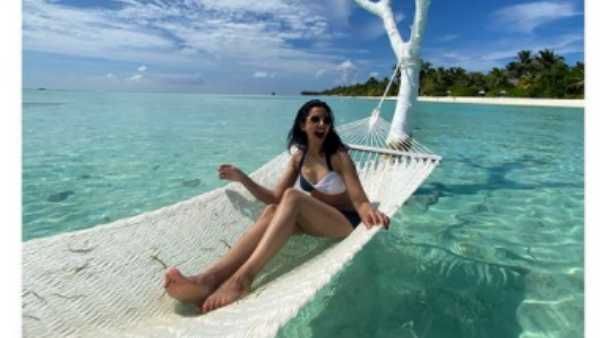 பிகினி உடையில் மாலத்தீவில் ஆட்டம் போட்ட ரகுல் ப்ரீத் சிங்...வைரலாகும் போட்டோ