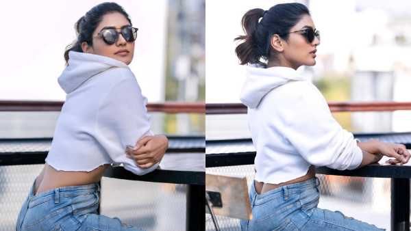 இப்படி போஸ் கொடுத்தா.. பசங்க பாவம் இல்லையா.. கிராப் டாப்பில் இடுப்பை காட்டி கதற விடும் ஈஷா ரெப்பா!