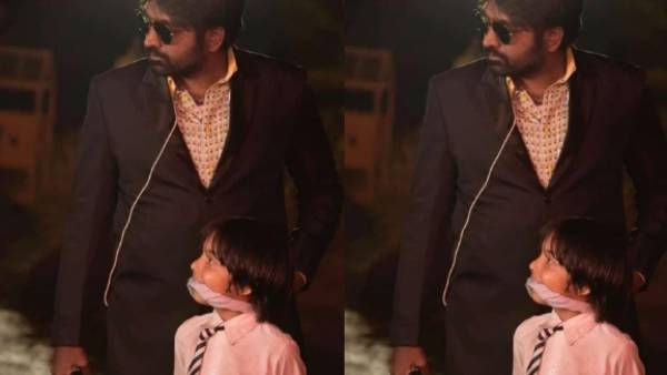 துப்பாக்கி முனையில் சிறுவனை கடத்தும் விஜய் சேதுபதி.. கோட் சூட் கூலர்ஸுடன்.. தீயாய் பரவும் போட்டோ!