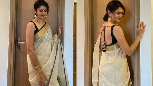 ஸ்லீவ்லெஸ் சேலையில் பளபளக்கும் முதுகை காட்டி சூடேத்தும் ஜெயம் ரவி படம் நடிகை!