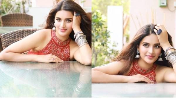 பங்குனி வெயில் போல பளபளக்கும் ஈஸ்வரன் பட நடிகை.. என்ன விலை அழகே!