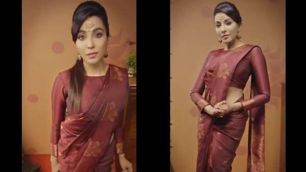 இடுப்பை வளைத்து நெளித்து தாமரையுடன் மல்லுக்கட்டும் பார்வதி நாயர்... வைரலாகும் வீடியோ