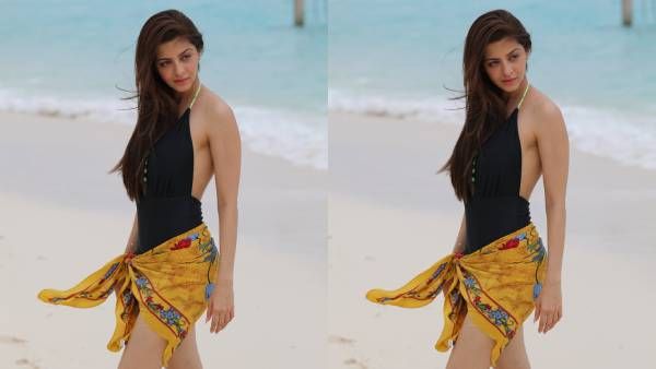 கடலில் கால் நனைத்து… பிகினியில் உச்சகட்ட கவர்ச்சி காட்டிய வேதிகா !