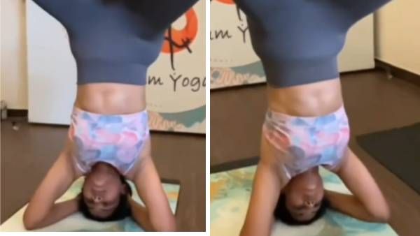 தலையை தரையில் ஊன்றி.. காலைத் தூக்கி போக்கஸ் செய்த ரம்யா பாண்டியன் .. செம!