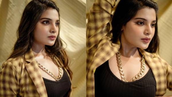 தாதா செயின்.. வில்லன் டைப் லாங் கோட்.. தங்க நிறத்தில் ஜொலிக்கும் ஆத்மிகா!