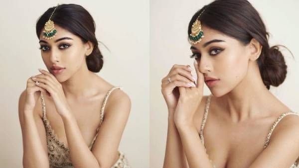 பளிங்குபோல மினுமினுக்கும் தேகம்… மழைக்கு இதமாக போஸ் கொடுத்த அனு இமானுவேல் !