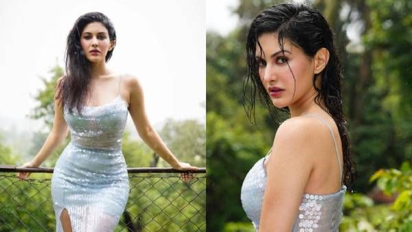 மழையில் நனைந்து... கவர்ச்சி உடையில் சூடேற்றிய தனுஷ் பட நடிகை!