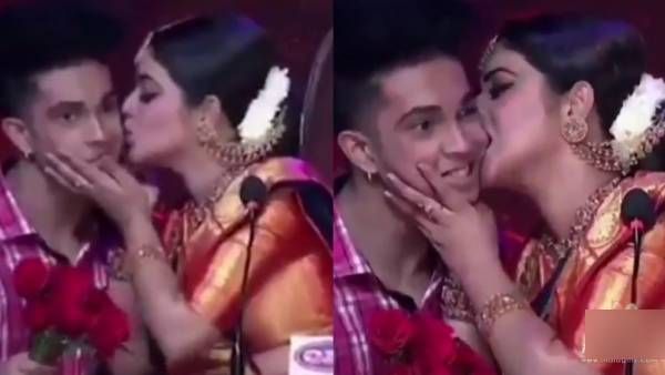 யப்பப்பா...மேடையில் முத்தமிட்டு, கன்னத்தை கடித்து... வைரலாகும் பூர்ணா வீடியோ