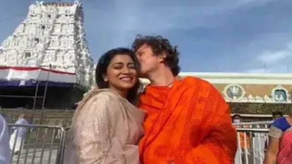 கோவிலுக்குள் முத்தம் கொடுத்து புனிதத்தை கெடுப்பதா? நடிகை ஸ்ரேயாவுக்கு குவியும் கண்டனம்!