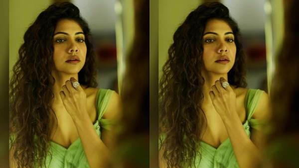 பச்சை உடையில் பால் போன்ற நிறத்தில் பற்ற வைக்கும் மடோனா செபாஸ்டின்!