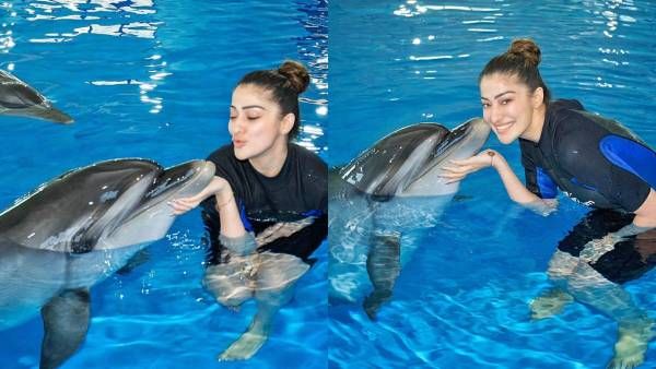 டால்ஃபினுக்கு முத்தம் கொடுக்கும் ராய் லட்சுமி..பாக்கும் போதே பதறுதே..தெறிக்கவிடும் புகைப்படங்கள் !