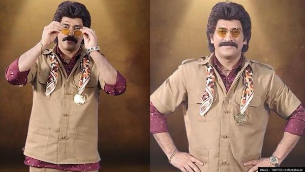 கூலிங் கிளாசை சுற்றி விட்டு… ரஜினி போல மாஸ் காட்டிய தோனி !