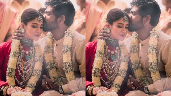 சிகப்பு நிற ரோஜா டிசைன் உடையில் நயன்தாரா.. கழுத்தில் தாலி.. நெற்றியில் விக்னேஷ் சிவன் முத்தம்!