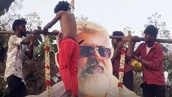 அலகு குத்தி தொங்கியபடி துணிவு பட கட்அவுட்டிற்கு பாலாபிஷேகம்.. மாலை அணிவித்த அஜித் ரசிகர்கள்!