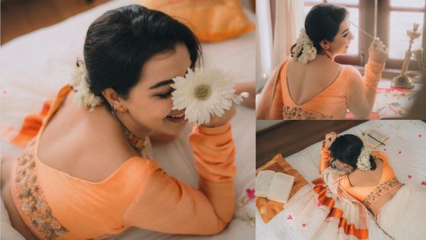 அடகடவுளே இப்படி எல்லாம் கூடவா நடக்கும்.. கட்டிலில் குப்புறப்படுத்து ஓணம் கொண்டாடிய நிக்கி கல்ராணி!