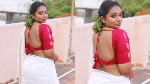 ஓணம் பண்டிகைக்கு இப்படியொரு குலுக்கல் குத்தாட்டமா.. சரக்கு பட நடிகையை பார்த்து திணறிய ரசிகர்கள்!