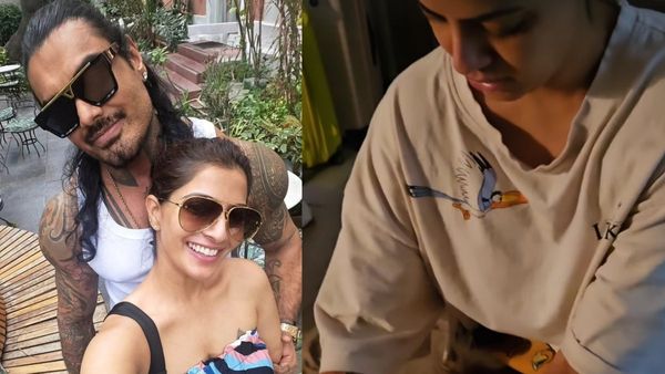 கணவரை காணோம்.. வரலட்சுமி படுக்கையறையில் யாரை கொஞ்சுறாரு பாருங்க.. செம க்யூட் வீடியோ!