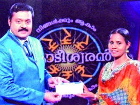 టీవీ రియాల్టీ షో : రూ. కోటి గెలుచుకున్న పోర్టరు భార్య