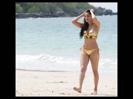 మగాళ్ళకు మనశ్శాంతి లేకుండా బికినీలో...(ఫొటోలు)