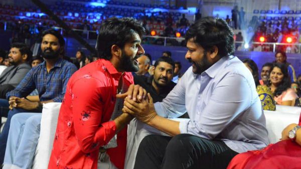 చిరు పాటలకు స్టెప్పులు.. మెగాస్టార్ పాదాలు తాకి పరవశించిన యంగ్ హీరో