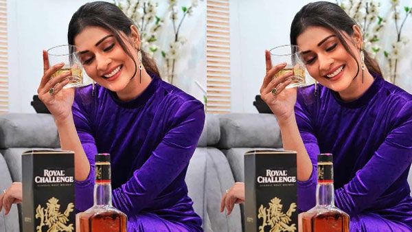 హీరోయిన్ ఎదురుగా ఫుల్ బాటిల్.. చేతిలో మందు గ్లాస్.. అసలు మ్యాటర్ ఇదన్నమాట!