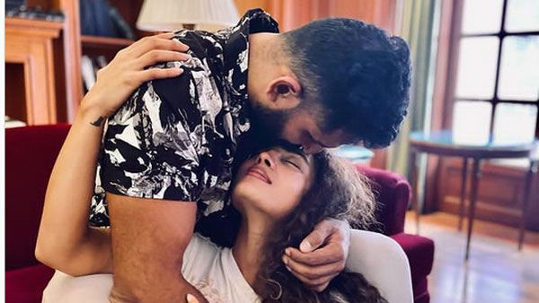 భర్త ఘాడమైన ముద్దు.. పరవశించిపోయిన బిగ్ బాస్ బ్యూటీ.. వైరల్ పిక్