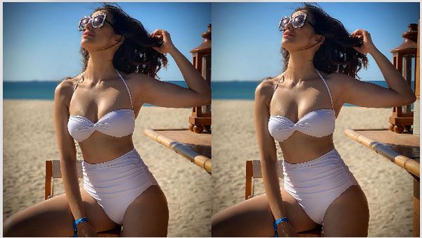 Raai Laxmi: తెల్లని బికినీలో మరోసారి రెచ్చిపోయిన రత్తాలు.. ఆ అందాలు చూస్తే మతిపోవాల్సిందే!