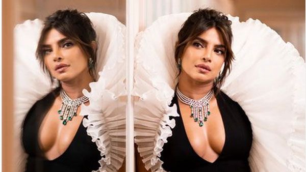 ప్రియాంక చోప్రా ఎద అందాల ఆరబోత: బటన్స్ విప్పేసి మరీ హాట్ షో