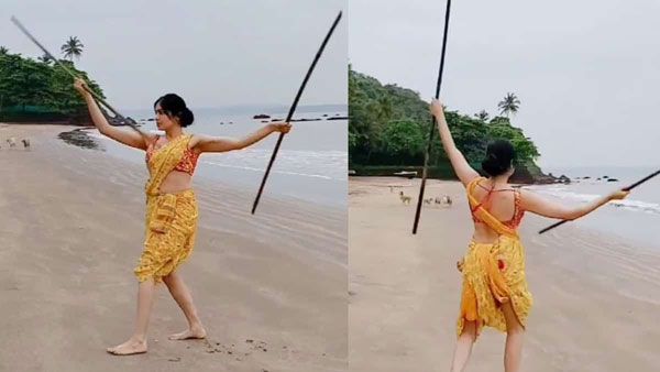 చీర పైకి కట్టి అదా శర్మ విన్యాసాలు..అది కర్రసామా లేక అన్ని అందాలు చూపించే సాధనమా?