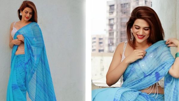 షర్ట్ బటన్స్ తీసేసి శ్రద్ధా దాస్ ఫ్రీ షో.. లోపలి అందాలు కనిపించేలా భంగిమలు