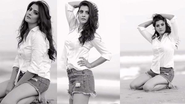 బీచ్‌లో రెచ్చిపోయిన వరలక్ష్మి: తొలిసారి ఓవర్‌గా అందాల ఆరబోస్తూ వీడియో