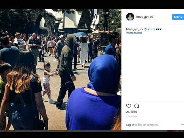 shahrukh-khan-spotted-hiding-his-face-while-walking-with-abram-in-usa