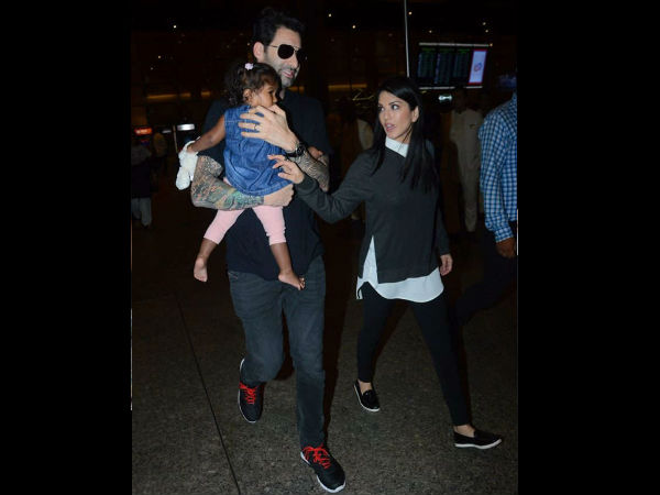 sunny-leone-daneil-weber-spotted-with-daughter-nisha-kaur-at-aiorport