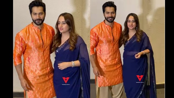 पत्नी के साथ पहुंचे वरुण