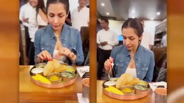 malaika-arora-brutally-trolled-for-pretending-to-eat-puri-bhaji-in-thali-says-what-a-waste