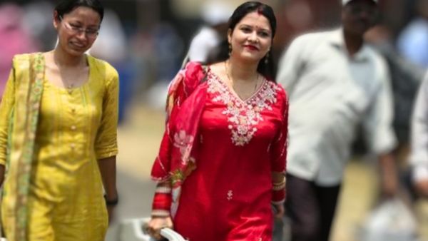 Red Suit Polling Officer