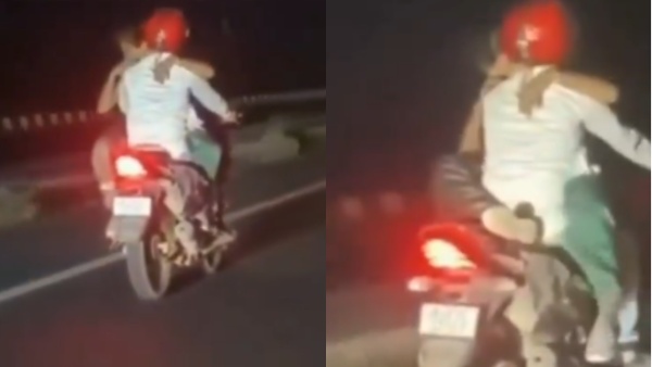 Couple romance on bike viral video
