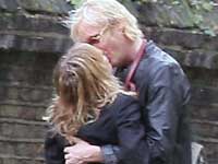 Rhys Ifans and Sienna Miller kissing