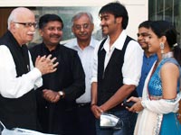 Advani with Ajay Devgan and Kajol